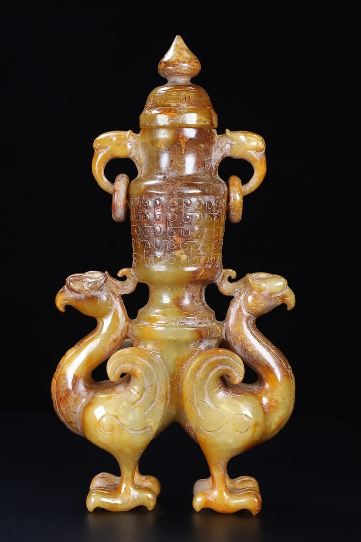An Exquisite White Jade Phoenix-Shaped Vase: An Exquisite White Jade Phoenix-Shaped Vase Han Dynasty, China Size:9.9inx5.5inx2in Weight:1.154kg白玉双凤鸟瓶 中国汉代 Size:25.2cmx14cmx5.2