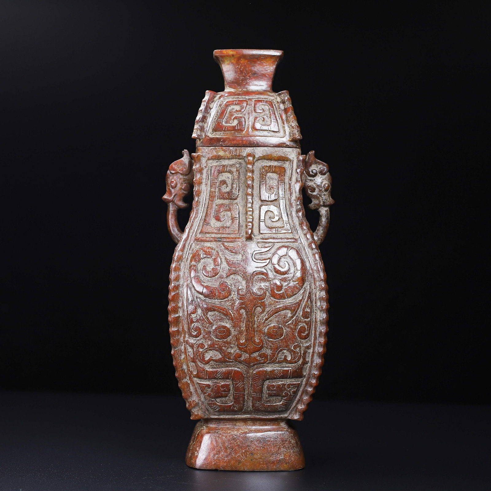 An Exquisite White Jade Beast-Face Pattern Double-Ears Vase: An Exquisite White Jade Beast-Face Pattern Double-Ears Vase Han Dynasty, China Size:7.4inx4.3inx3.2in Weight:2.076kg白玉兽面双耳瓶 中国汉