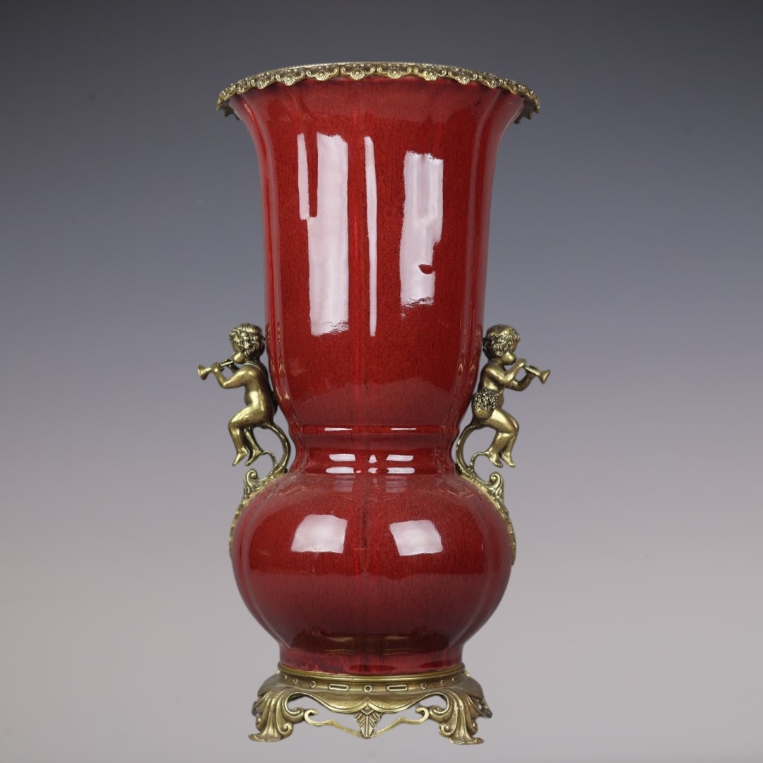 An Exquisite Iron-Red Inlaid Bronze Double-Ears Vase: An Exquisite Iron-Red Inlaid Bronze Double-Ears Vase Qing Dynasty, China Yongzheng Six-character Mark Size:20.1inx10.6in矾红釉镶铜天使奏乐双