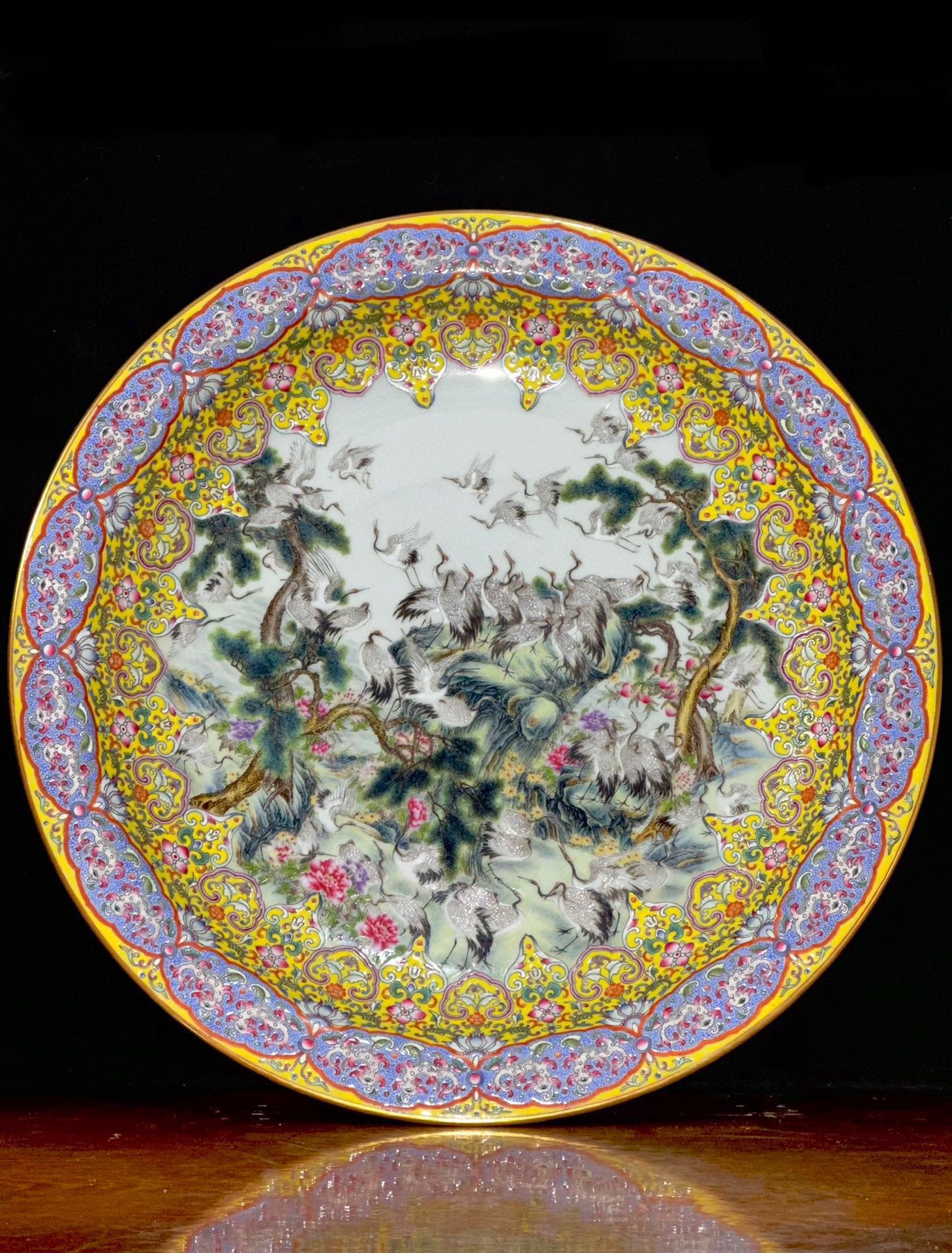 An Exquisite Enamel Lotus Pattern Pine and Crane Pattern Plate: An Exquisite Enamel Lotus Pattern Pine and Crane Pattern Plate Qing Dynasty, China Qianlong Six-character Mark Size:2.2inx14.5in珐琅彩黄地如意螭龙