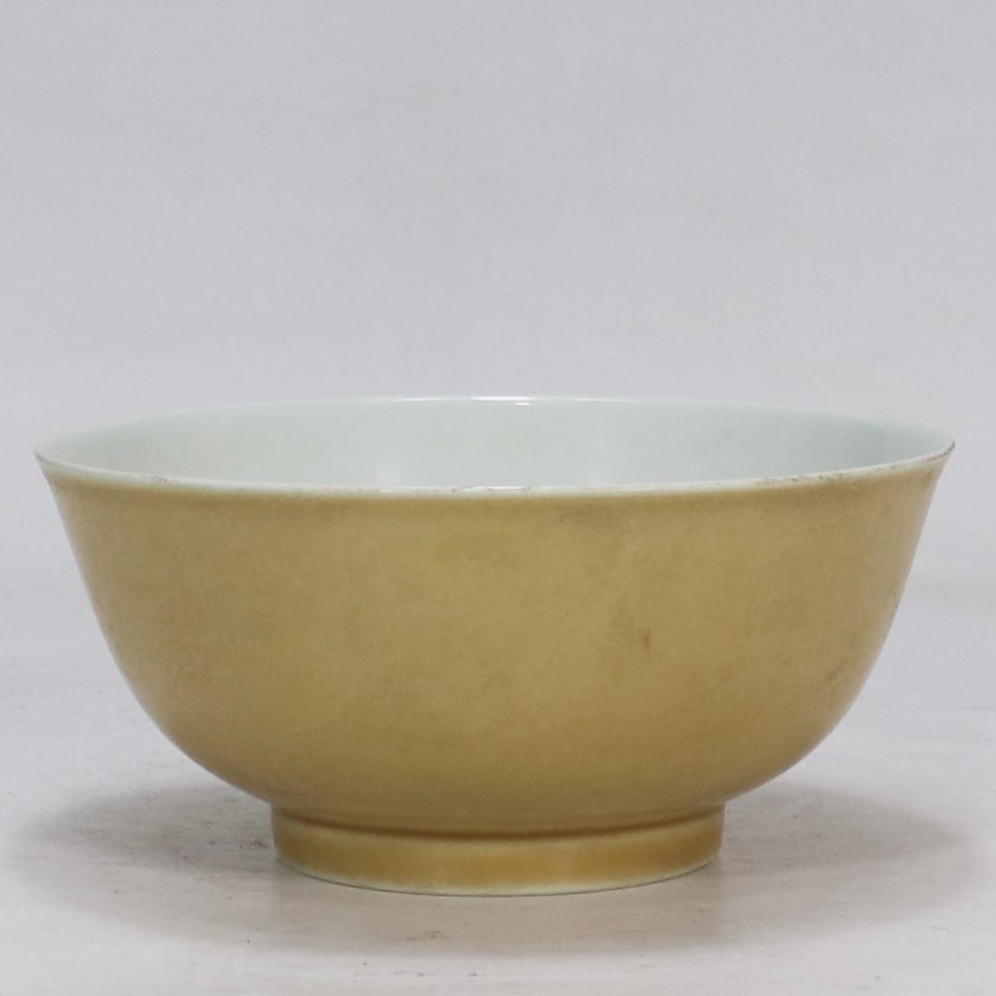 A Exquisite Yellow Glazed Bowl: A Exquisite Yellow Glazed Bowl,Ming Dynasty, China,Xuande Six-character Mark,Size:3.1inx6.7in 黄釉碗,中国明代,宣德六字款