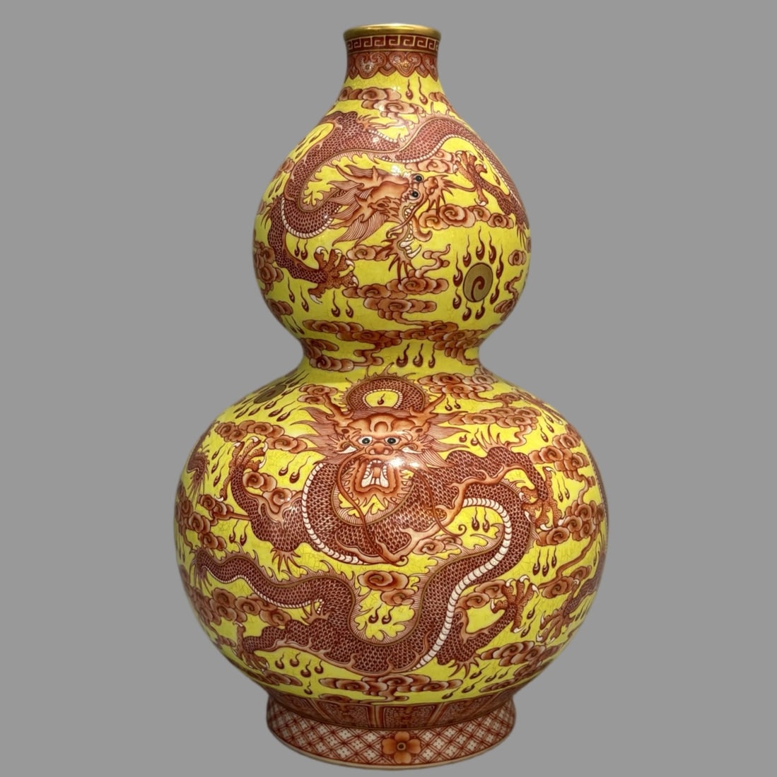 A Exquisite Yellow Ground Famille-Rose Iron-Red Painted Gold Dragon Pattern Gourd Vase: A Exquisite Yellow Ground Famille-Rose Iron-Red Painted Gold Dragon Pattern Gourd Vase,Qing Dynasty, China,Qianlong Six-character Mark,Size:12.2inx8.7in