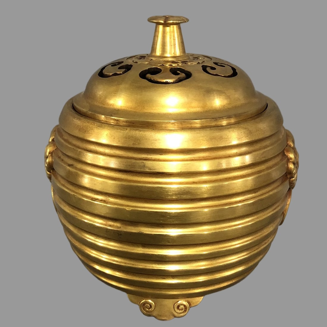 A Exquisite Gilt Bronze Tripod Censer: A Exquisite Gilt Bronze Tripod Censer,Ming Dynasty, China,Xuande Six-character Mark,Size:5.7inx6.1in, Weight:2562g