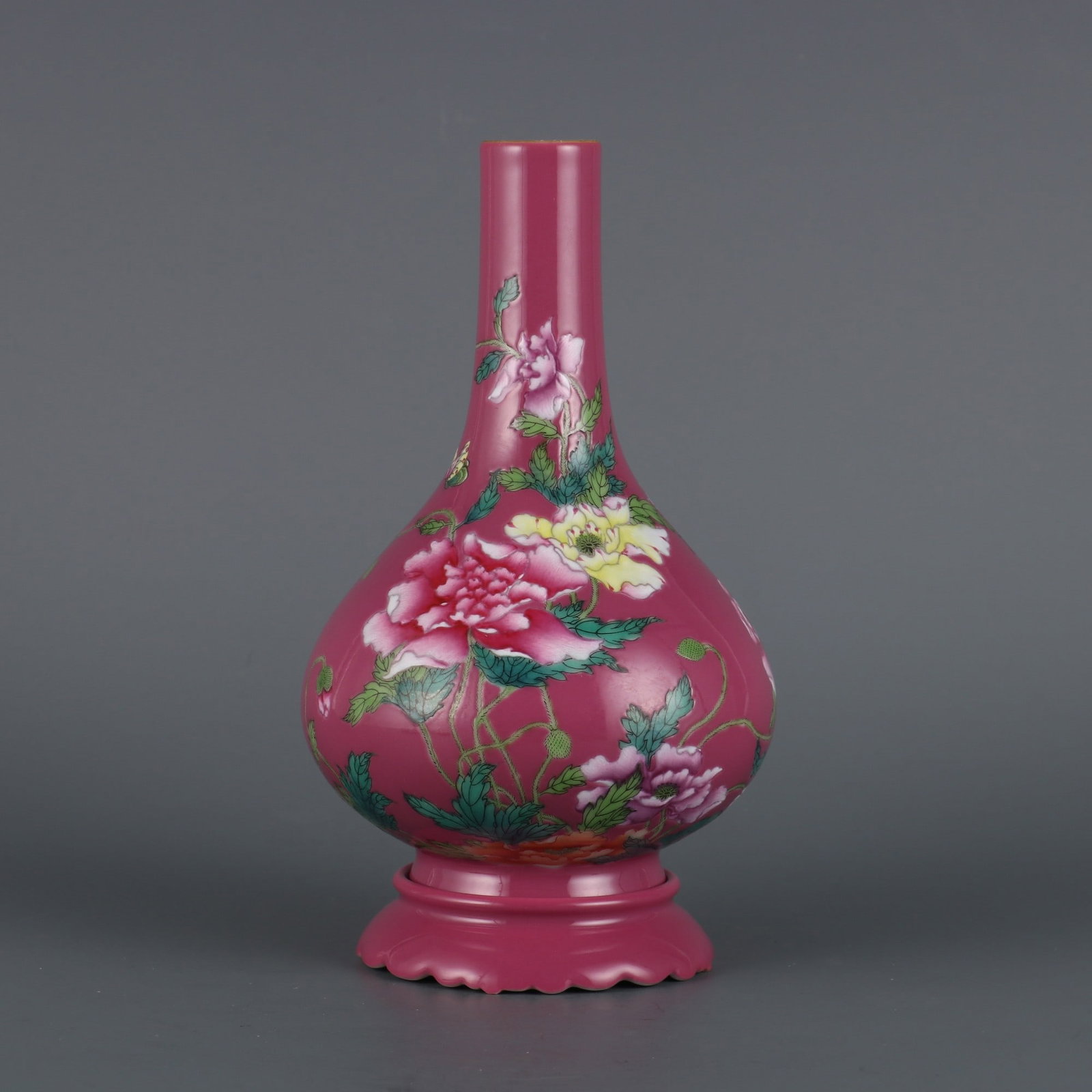 A Exquisite Ruby Red-Glazed Ground Famille-Rose Flower Pattern Vase: A Exquisite Ruby Red-Glazed Ground Famille-Rose Flower Pattern Vase,Qing Dynasty, China,Qianlong Six-character Mark,Size:7.3inx4.1in 胭脂红地粉彩花卉