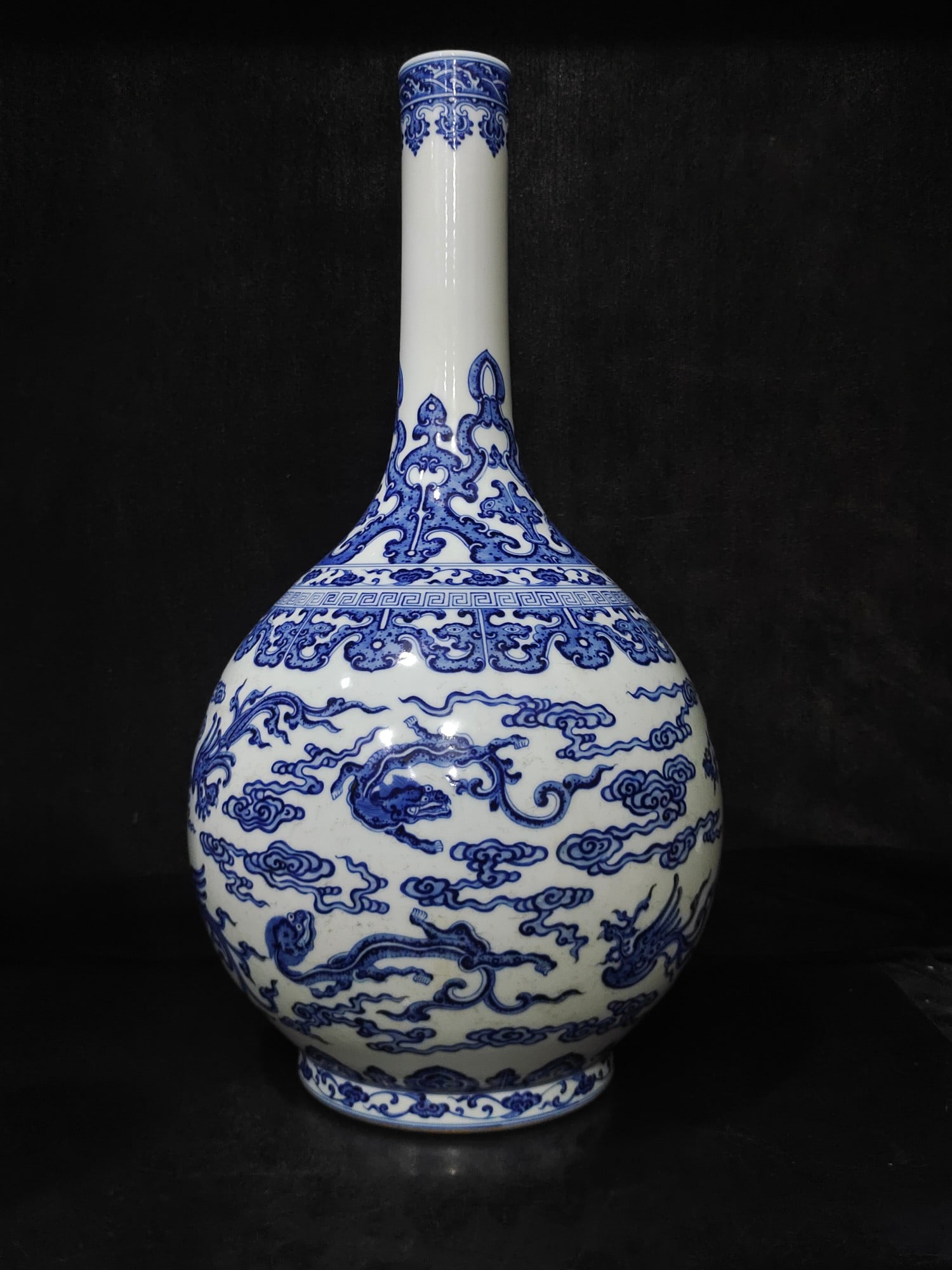 A Exquisite Blue and White Dragon Phoenix Pattern Vase: A Exquisite Blue and White Dragon Phoenix Pattern Vase,Qing Dynasty, China,Qianlong Six-character Mark,Size:20.9inx10.2inx2.4in 青花龙纹凤纹瓶,中国