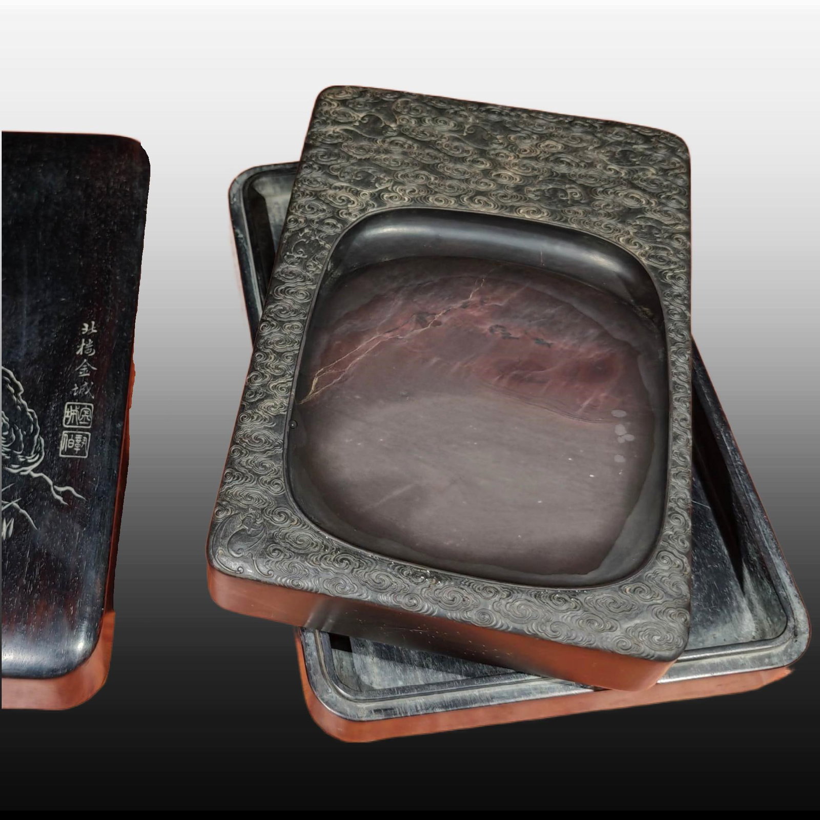 A Exquisite Auspicious Cloud and Fu Pattern Duan Inkstone: A Exquisite Auspicious Cloud and Fu Pattern Duan Inkstone,Modern Time of China,With Mark,Size:9.8inx6.8inx2.5in 云福纹端砚,近现代,带款