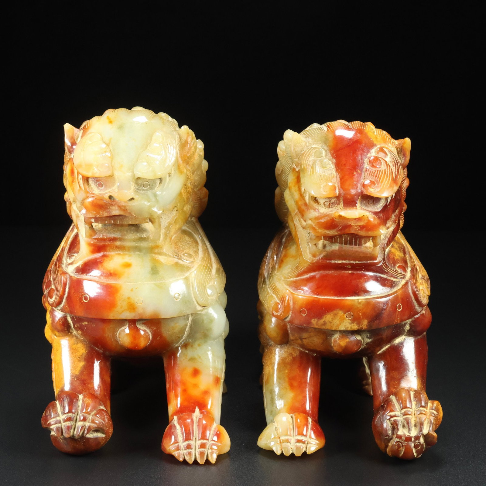 A pair of Exquisite Hotan Jade Lion Ornaments: A pair of Exquisite Hotan Jade Lion Ornaments,Han Dynasty, China,Size:5.5inx6.7inx3.5in,Weight:3532g 一对和田玉狮摆件,中国汉代