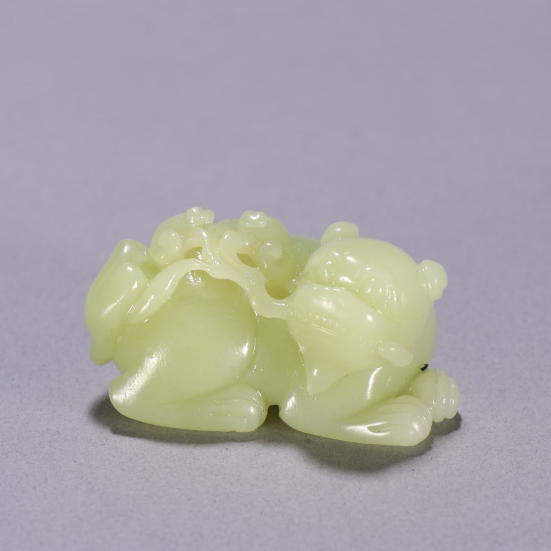 A Exquisite Hotan Yellow Jade Auspicious Beast Ornament: A Exquisite Hotan Yellow Jade Auspicious Beast Ornament,Qing Dynasty, China,Size:1.1inx2.1in,Weight:66.5g