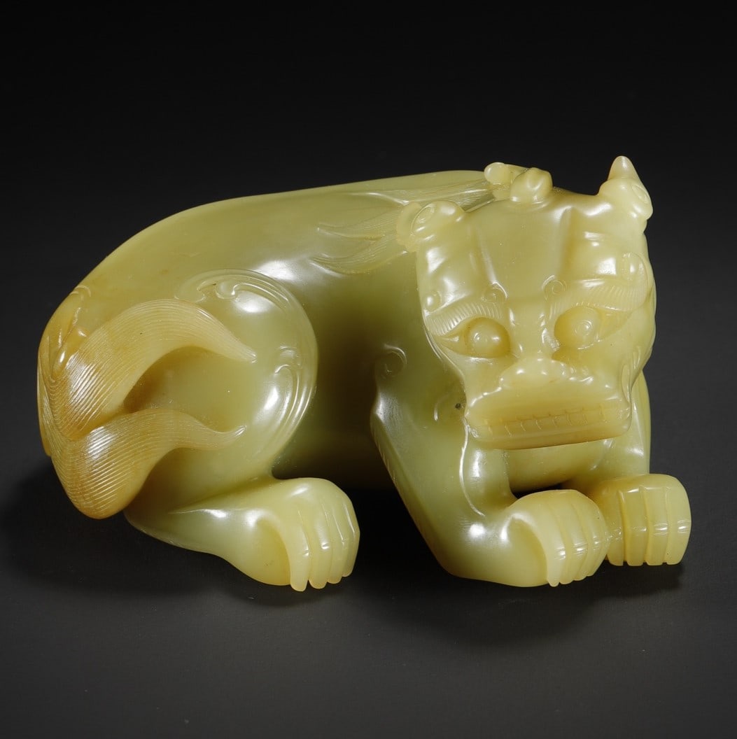 A Exquisite Hotan Yellow Jade Auspicious Beast Ornament: A Exquisite Hotan Yellow Jade Auspicious Beast Ornament,Qing Dynasty, China,Size:4.1inx2.8inx2.3in,Weight:532.7g