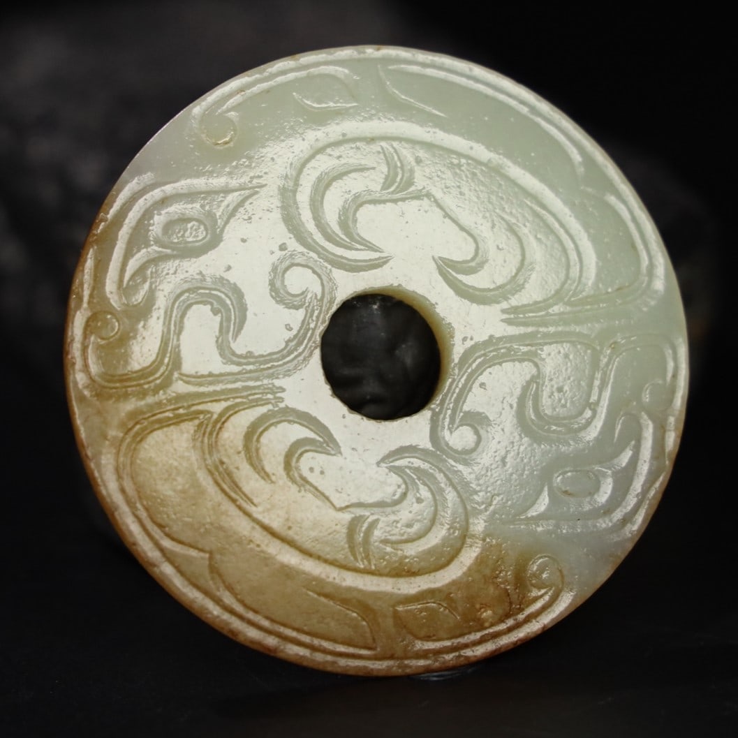 A Exquisite Hotan Jade Tiger Pattern Bi: A Exquisite Hotan Jade Tiger Pattern Bi,Han Dynasty, China,Size:2.4inx0.2in,Weight:37.3g 和田玉虎纹玉璧,中国汉代