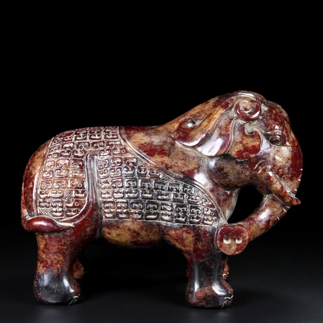 A Exquisite Hotan Jade Elephant Ornament: A Exquisite Hotan Jade Elephant Ornament,Han Dynasty, China,Size:9.8inx4.7inx7.5in,Weight:12000g 和田玉象摆件,中国汉代