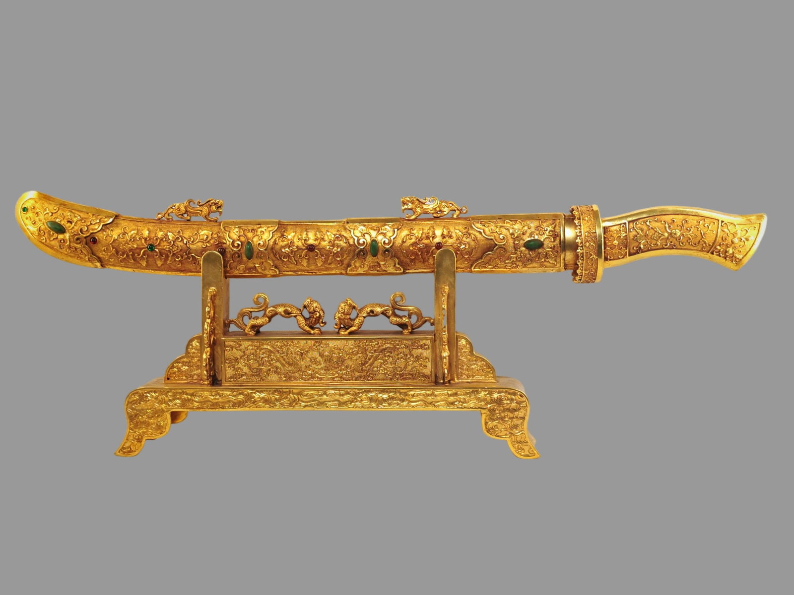 A Exquisite Gilt Bronze Knife: A Exquisite Gilt Bronze Knife,Qing Dynasty, China,Qianlong Four-character Mark,Size:9.8inx28.3in