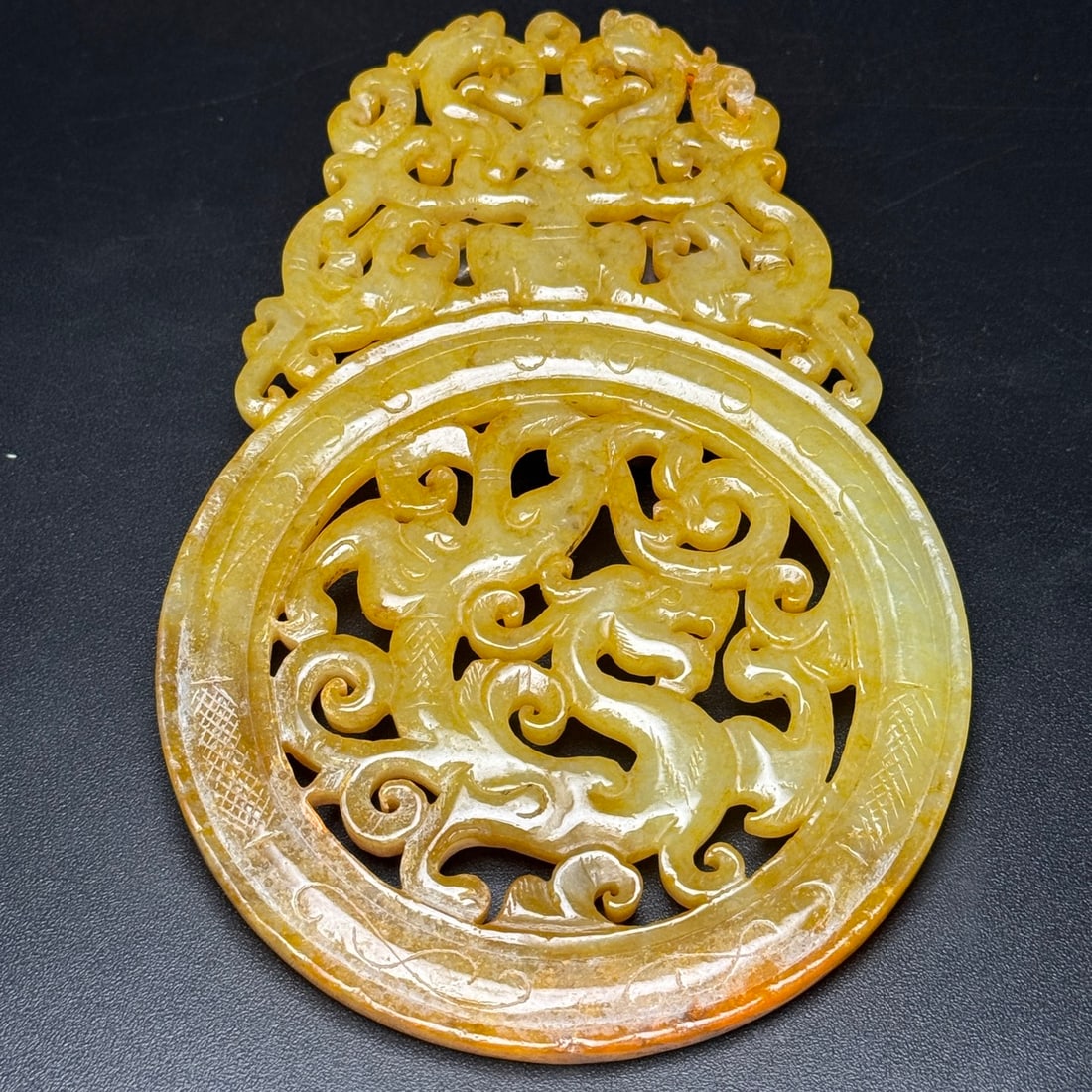 A Exquisite Hotan Jade Dragon Pattern Plaque: A Exquisite Hotan Jade Dragon Pattern Plaque,Han Dynasty, China,Size:5.5inx3.7inx0.2in,Weight:120g 和田玉龙纹牌,中国汉代
