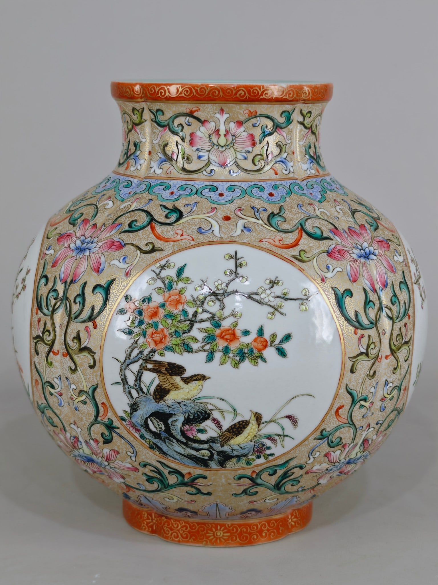 A Exquisite Famille-Rose Lotus Pattern Flower and Bird Pattern Vase: A Exquisite Famille-Rose Lotus Pattern Flower and Bird Pattern Vase,Qing Dynasty, China,Qianlong Six-character Mark,Size:8.1inx7.5in 粉彩缠枝莲花鸟纹
