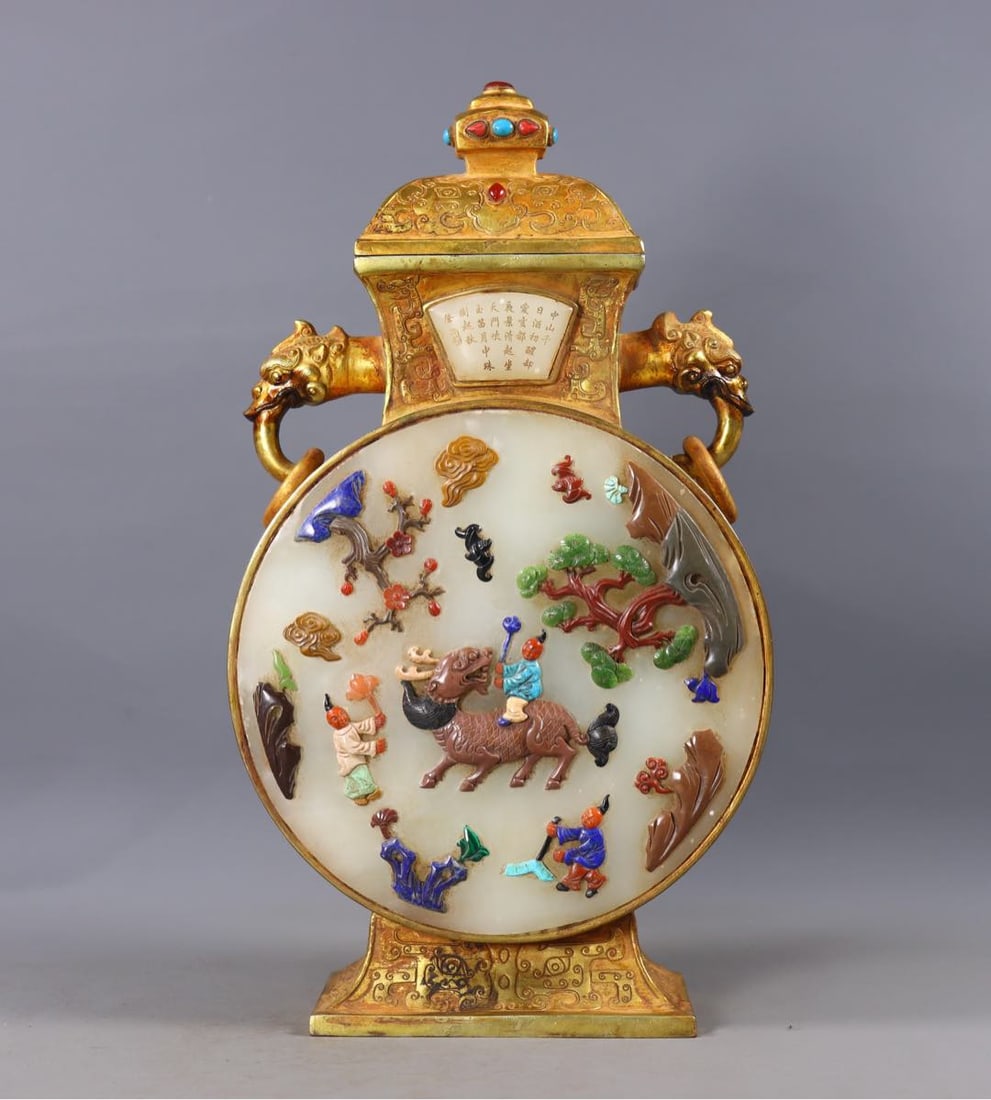A Exquisite Gilt Bronze Inlaid Hotan Jade Double-Ears Vase: A Exquisite Gilt Bronze Inlaid Hotan Jade Double-Ears Vase,Qing Dynasty, China,Qianlong Four-character Mark,Size:12.4inx6.9inx3in,Weight:2819g