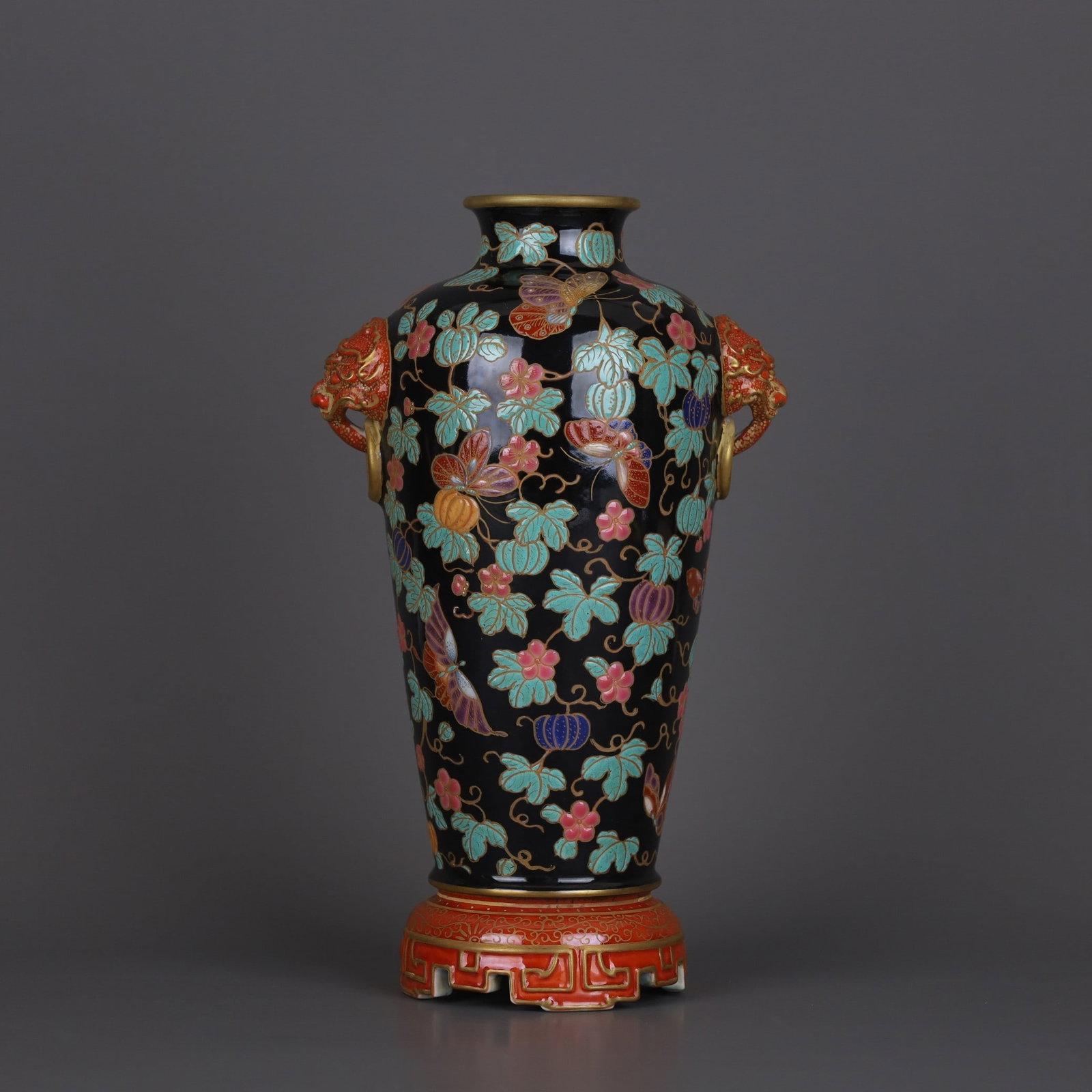A Exquisite Black Ground Enamel Flower Fruit Pattern Beast Ears Vase: A Exquisite Black Ground Enamel Flower Fruit Pattern Beast Ears Vase,Qing Dynasty, China,Qianlong Four-character Mark,Size:8.6inx5.3in
