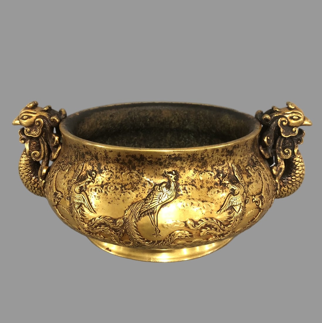 A Exquisite Gilt Bronze Phoenix-Ear Censer: A Exquisite Gilt Bronze Phoenix-Ear Censer,Ming Dynasty, China,With Mark,Size:9.8inx4.1in, Weight:3780g 铜鎏金凤耳炉,中国明代,带હ