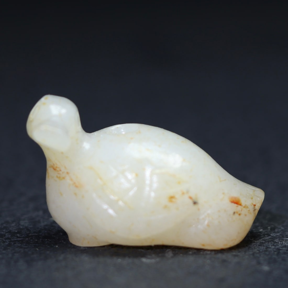 A Exquisite Hotan Jade Bird Handheld Carving: A Exquisite Hotan Jade Bird Handheld Carving,Han Dynasty, China,Size:1.6inx0.8inx0.9in ,Weight:12.6g 和田玉鸟手把件,中国汉代
