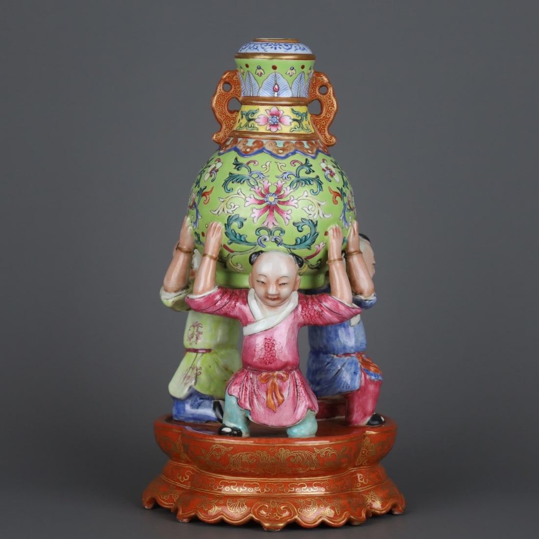 A Exquisite Iron Red Painted Gold Famille Rose Lotus Pattern Vase: A Exquisite Iron Red Painted Gold Famille Rose Lotus Pattern Vase,Qing Dynasty, China,Qianlong Six-character Mark,Size:8.1inx4.6in 矾红描金粉彩缠枝ő