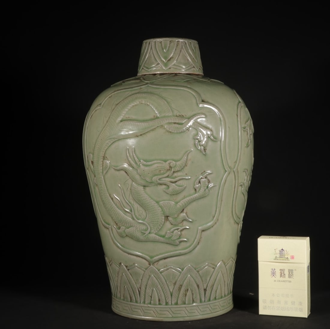 A Exquisite Yue Yao Celadon Glazed Dragon Pattern Vase: A Exquisite Yue Yao Celadon Glazed Dragon Pattern Vase,Five Dynasties,Size:13inx8.3in 越窑青釉龙纹瓶,五代