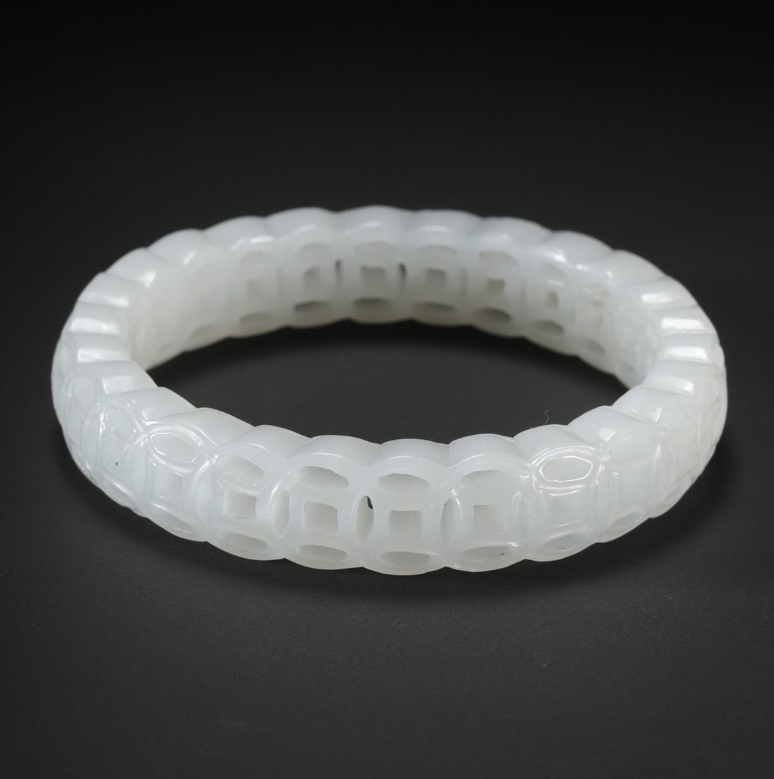 A Exquisite Hotan Jade Bracelet: A Exquisite Hotan Jade Bracelet,Qing Dynasty, China,Size:2.2inx0.5in,Weight:31.6g 和田玉手镯,中国清代