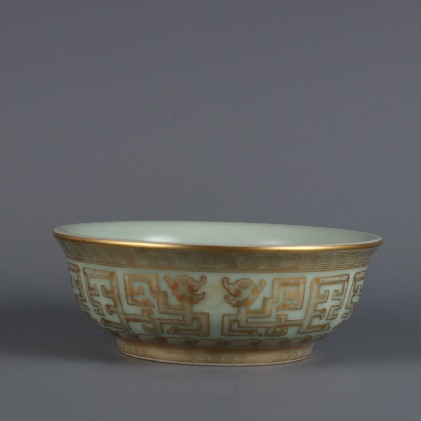 A Exquisite Pea-Green Glaze Painted Gold Phoenix Pattern Bowl: A Exquisite Pea-Green Glaze Painted Gold Phoenix Pattern Bowl,Qing Dynasty, China,Daoguang Six-character Mark,Size:2.4inx6.4in