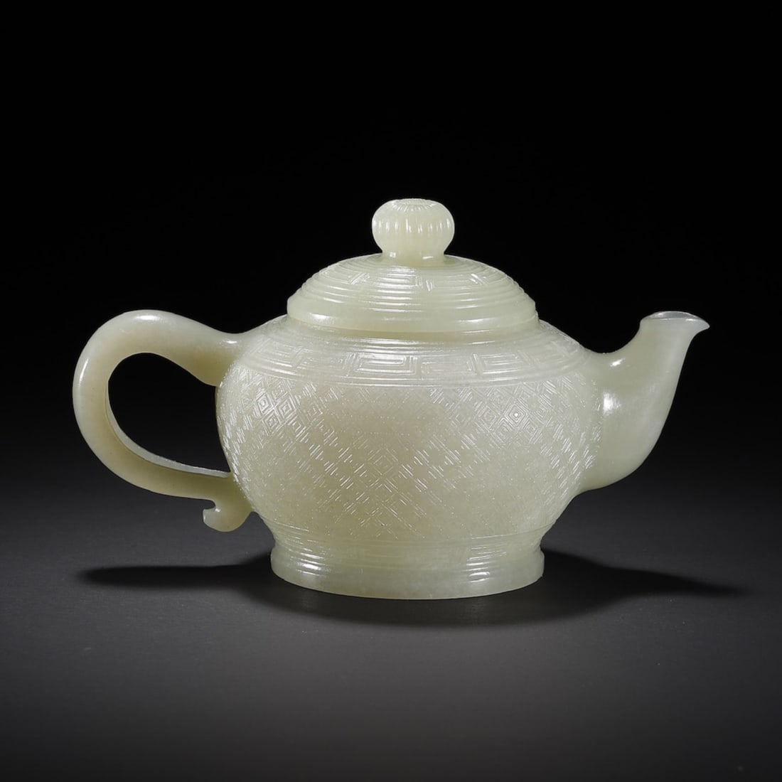 A Exquisite Hotan Jade Ewer: A Exquisite Hotan Jade Ewer,Qing Dynasty, China,Size:5.1inx3.1inx3in,Weight:153g 和田玉壶,中国清代