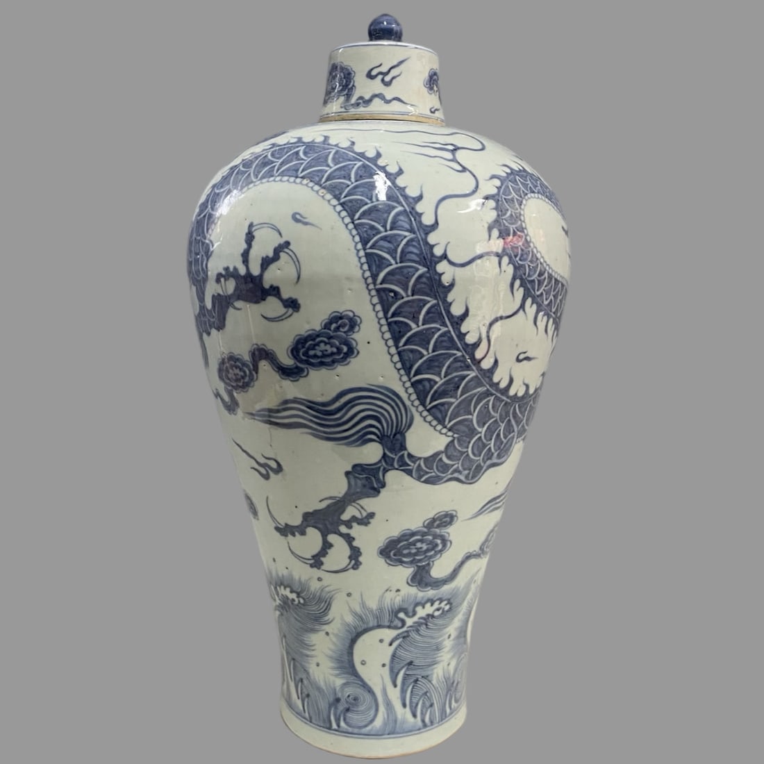 A Exquisite Blue and White Seawater Dragon Pattern Vase: A Exquisite Blue and White Seawater Dragon Pattern Vase,Yuan Dynasty, China,Size:18.7inx2.2in 中国元代,青花海水龙纹瓶