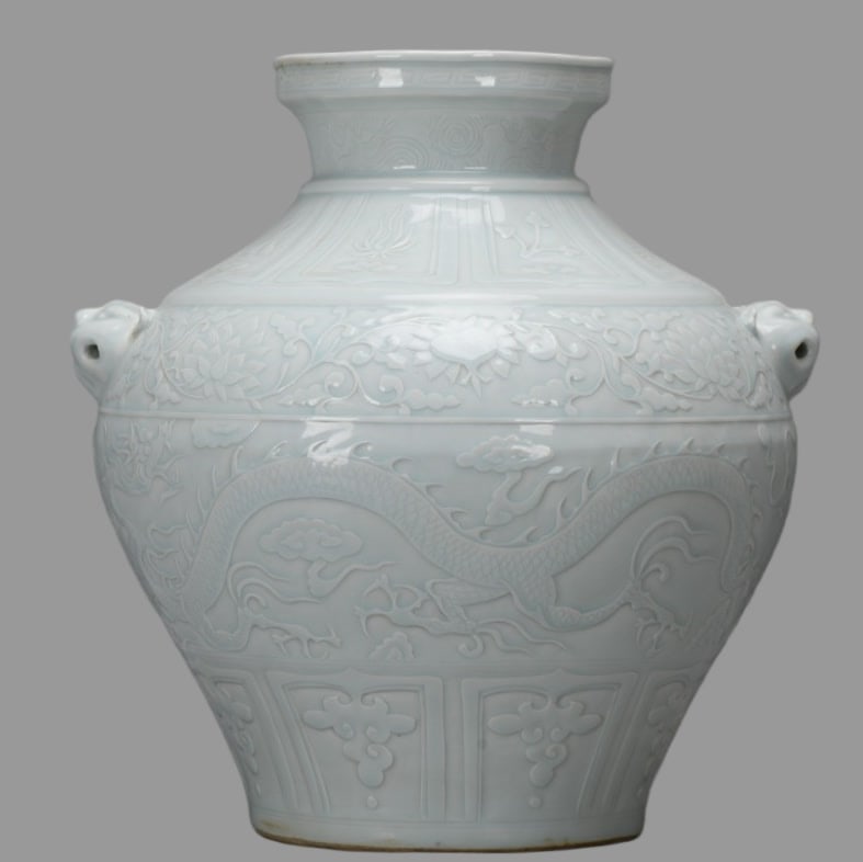 A Exquisite Shadow Blue Glazed Dragon Pattern Jar: A Exquisite Shadow Blue Glazed Dragon Pattern Jar,Yuan Dynasty, China,Size:14.6inx6.3inx13.8inx7.1in 影青釉龙纹罐,中国元代
