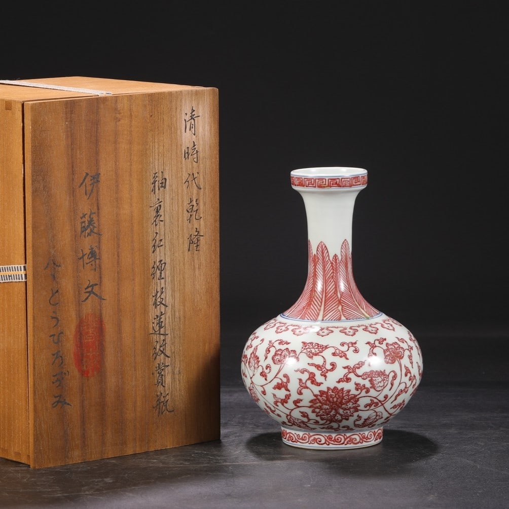 A Exquisite Underglaze-Red Lotus Pattern Vase: A Exquisite Underglaze-Red Lotus Pattern Vase,Qing Dynasty, China,Qianlong Six-character Mark,Size:8.5inx2.4inx5.5in 釉里红缠枝莲纹瓶,中国&#