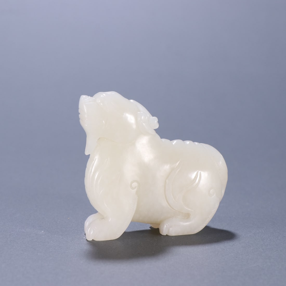 A Exquisite Hotan Jade Auspicious Beast Ornament (1 of 9)