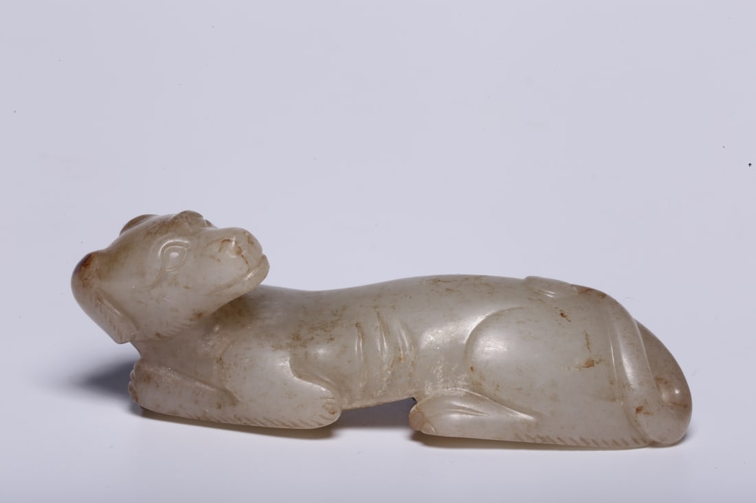 A Exquisite Hotan Jade Dog Ornament: A Exquisite Hotan Jade Dog Ornament,Han Dynasty, China,Size:3.1inx1inx1.1in,Weight:66.3g 和田玉狗摆件,中国汉代