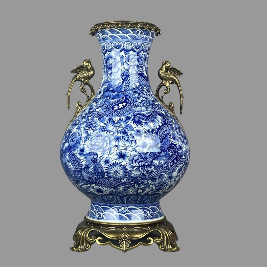 A Exquisite Blue and White Copper Inlay Dragon Pattern Bird Ears Vase: A Exquisite Blue and White Copper Inlay Dragon Pattern Bird Ears Vase,Qing Dynasty, China,Qianlong Six-character Mark,Size:18.9inx6.3inx10.6inx9.1in 青花镶铜龙纹