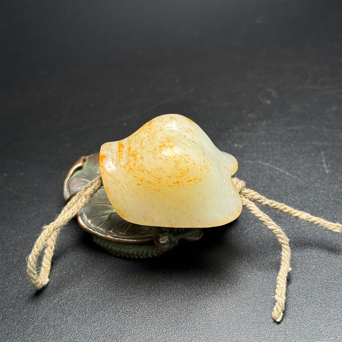 A Exquisite Hotan Jade Handheld Carving: A Exquisite Hotan Jade Handheld Carving,Han Dynasty, China,Size:1.5inx1.1inx0.8in,Weight:30g 和田玉手把件,中国汉代