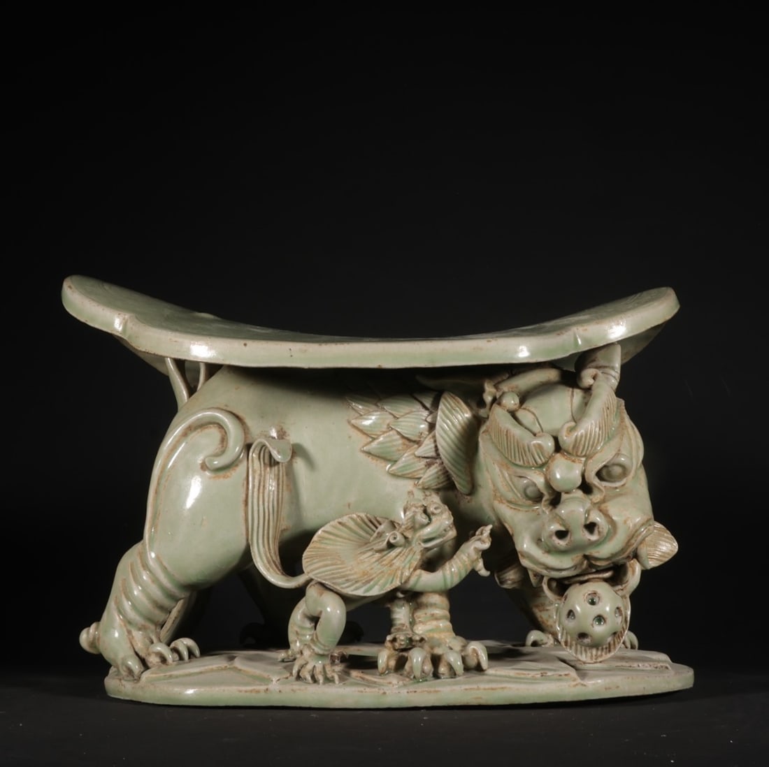 A Exquisite Yue Yao Celadon Glazed Lion Shape Pillow: A Exquisite Yue Yao Celadon Glazed Lion Shape Pillow,Five Dynasties,Size:6.3inx9.1inx5.7in 越窑青釉狮形枕,五代