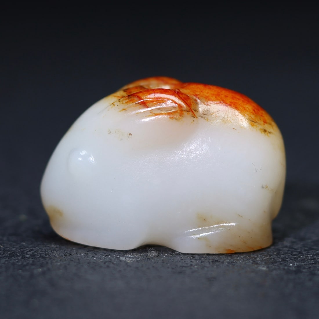 A Exquisite Hotan Jade Rabbit Handheld Carving: A Exquisite Hotan Jade Rabbit Handheld Carving,Han Dynasty, China,Size:1.3inx0.9inx0.7in ,Weight:26.3g 和田玉兔手把件,中国汉代