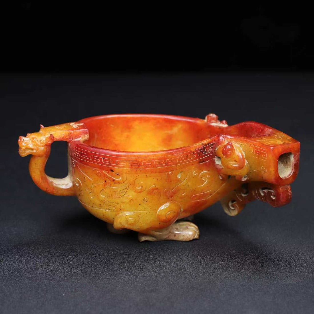 A Exquisite Hotan Jade Auspicious Beast Cup: A Exquisite Hotan Jade Auspicious Beast Cup,Han Dynasty, China,Size:6.7inx3.5inx2.8in,Weight:525.5g 和田玉瑞兽杯,中国汉代