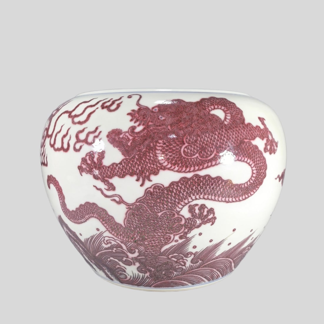A Exquisite Underglaze-Red Seawater Dragon Pattern Vat: A Exquisite Underglaze-Red Seawater Dragon Pattern Vat,Qing Dynasty, China,Kangxi Six-character Mark,Size:10inx8.8inx14inx8.5in 釉里红海水龙纹缸,中