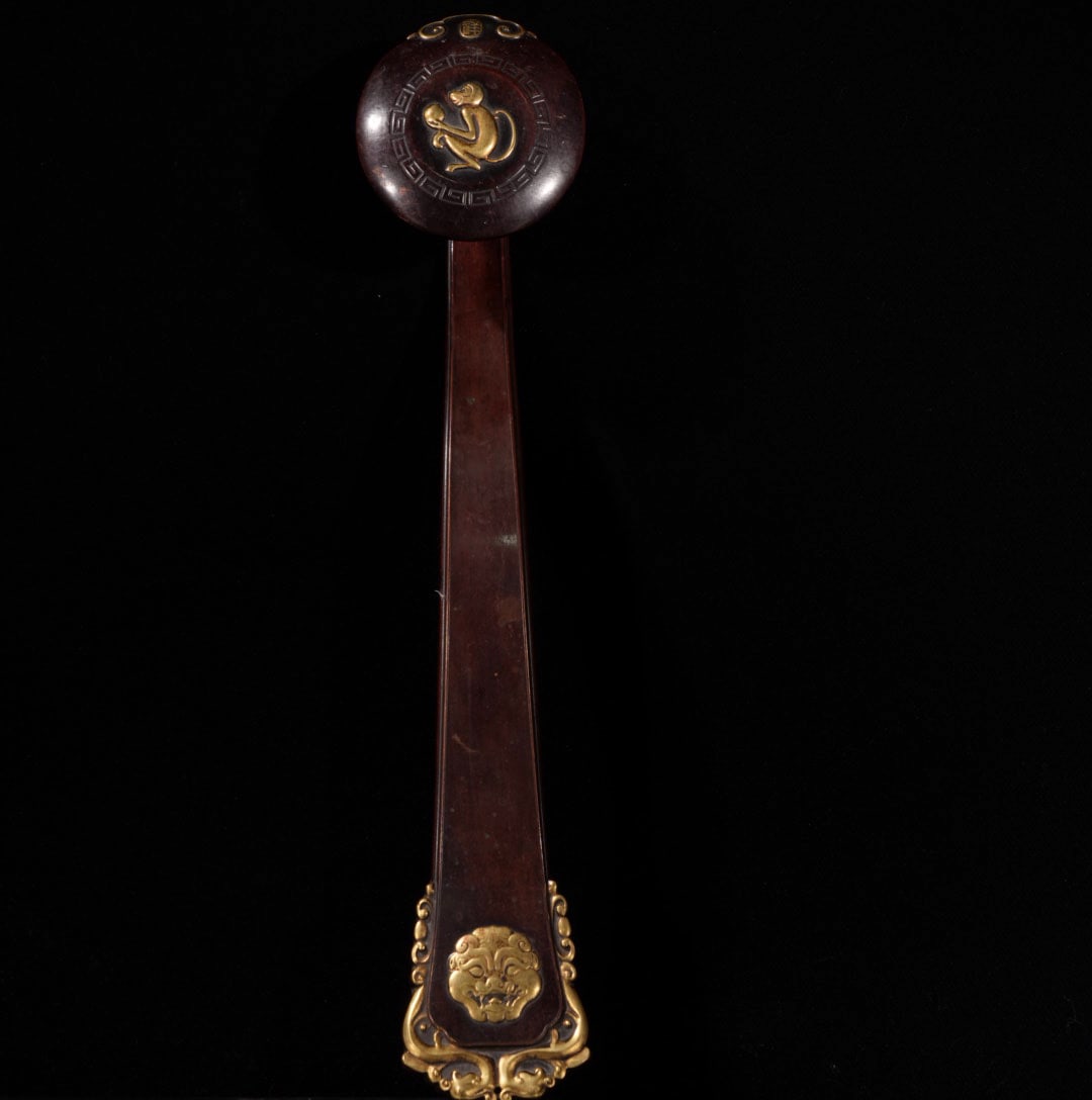 A Exquisite Red Copper Gilt Bronze Ruyi Ornament: A Exquisite Red Copper Gilt Bronze Ruyi Ornament,Ming Dynasty, China,With Mark,Size:14.6in,Weight:880g 紫铜鎏金如意摆件,中国明代