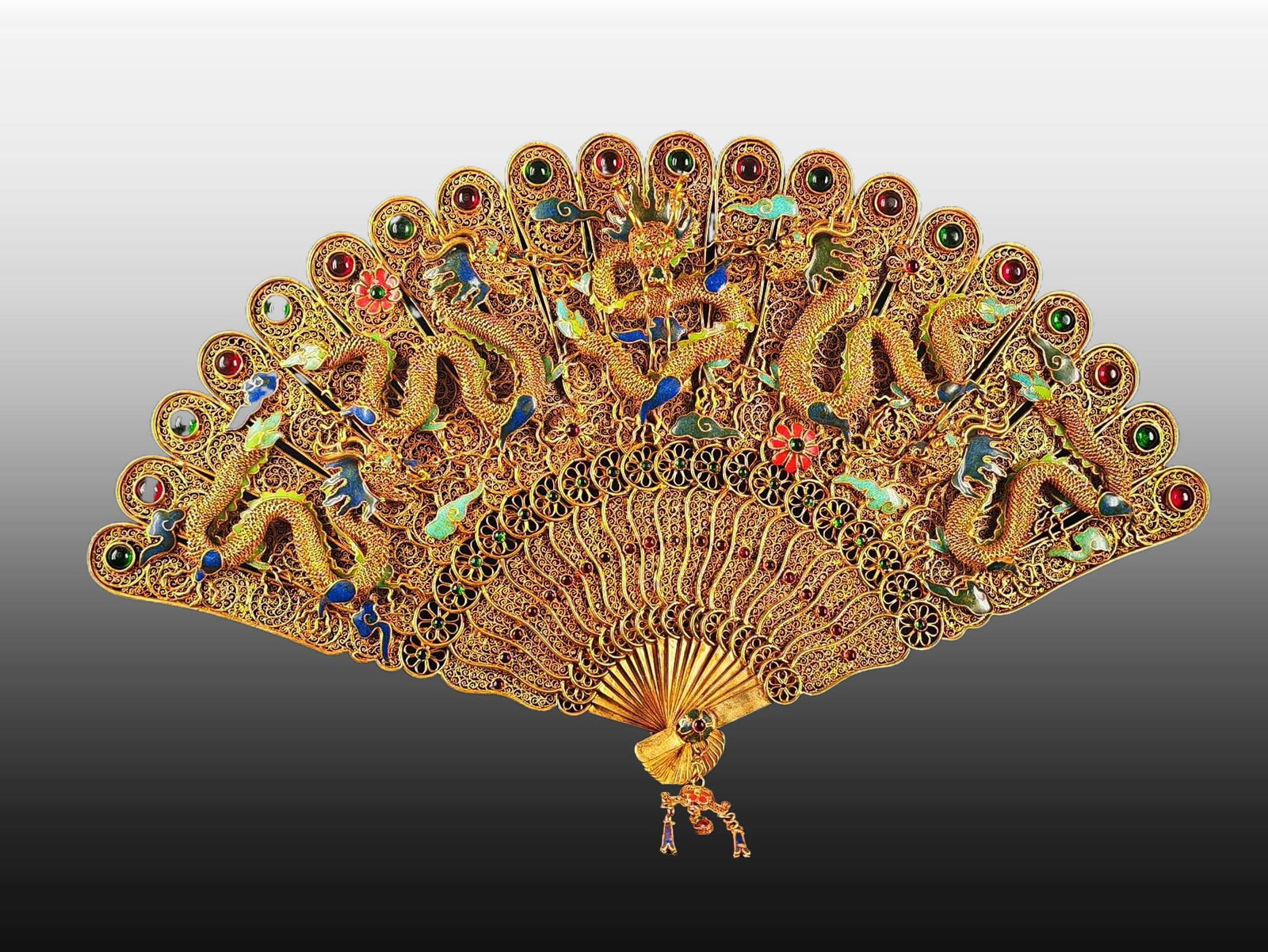 A Exquisite Filigree Gilt Inlaid Gems Dragon Pattern Fan: A Exquisite Filigree Gilt Inlaid Gems Dragon Pattern Fan,Qing Dynasty, China,Qianlong Four-character Mark,Size:17.1inx10.2in