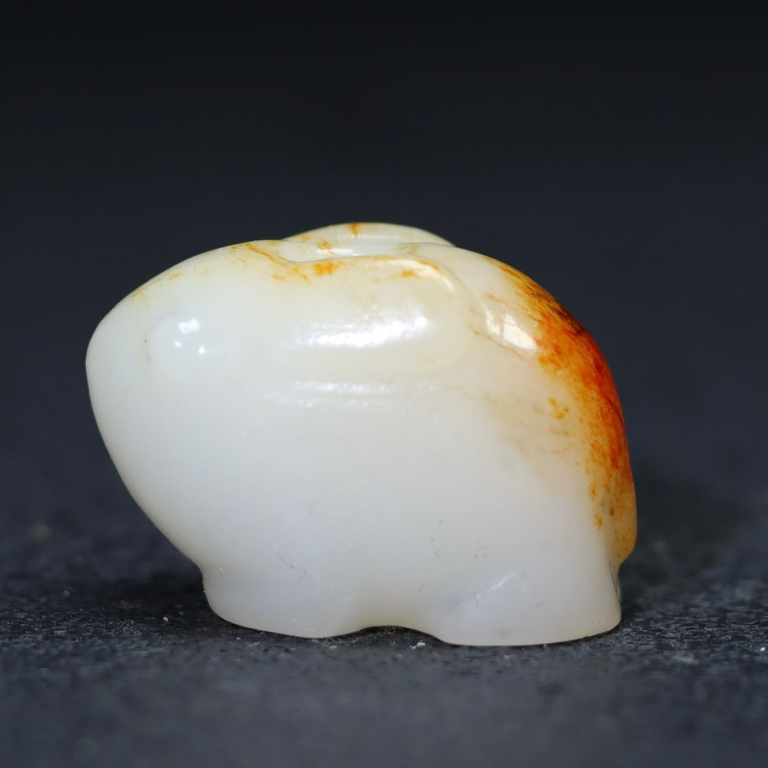 A Exquisite Hotan Jade Rabbit Handheld Carving: A Exquisite Hotan Jade Rabbit Handheld Carving,Han Dynasty, China,Size:1.1inx0.8inx0.6in ,Weight:15.9g 和田玉兔手把件,中国汉代