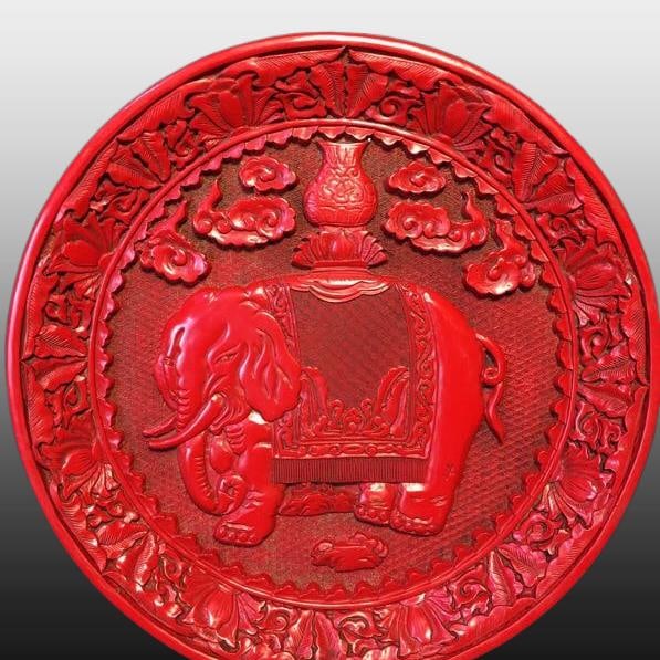 A Exquisite Carved Red Lacquer Elephant Pattern Plate: A Exquisite Carved Red Lacquer Elephant Pattern Plate,Qing Dynasty, China,Size:11.4inx11.4in ,Weight:990g 漆器剔红象纹盘,中国清代