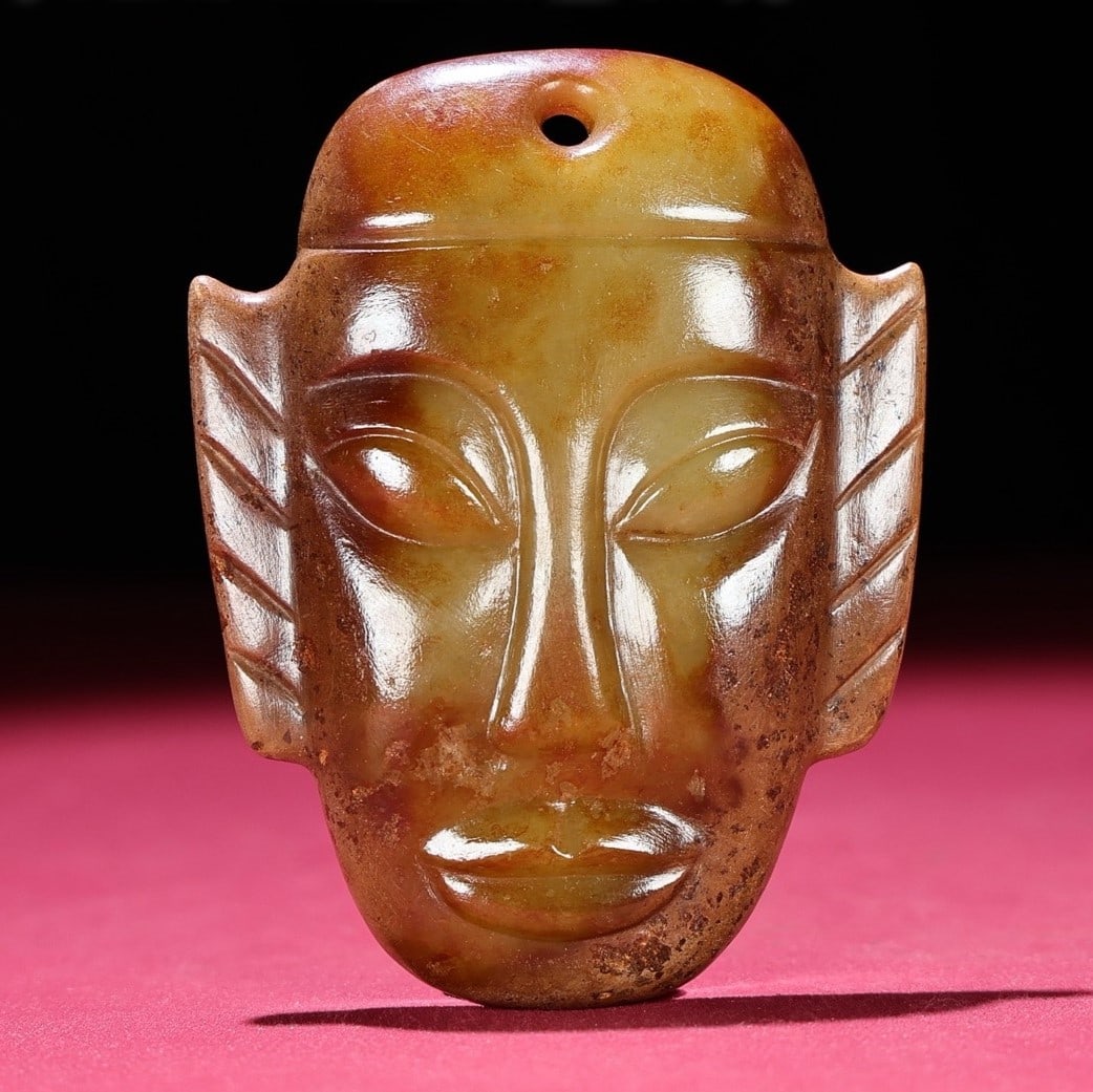 A Exquisite Hetian Jade Human Face Ornament: A Exquisite Hetian Jade Human Face Ornament,Han Dynasty, China,Size:2.8inx3.7inx0.5in,Weight:97g 和田玉人面摆件,中国汉代
