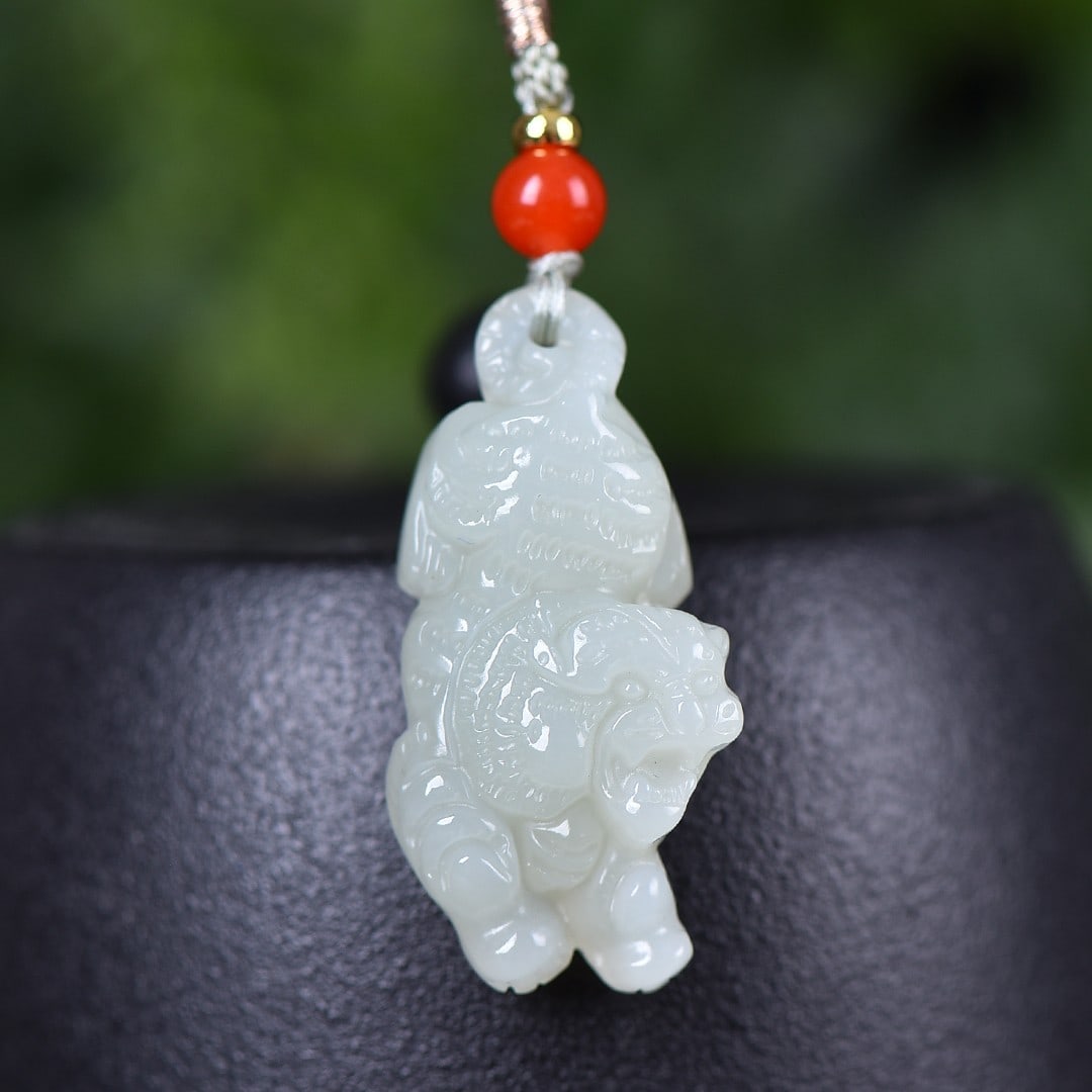 A Exquisite Hotan Jade Tiger Pendant: A Exquisite Hotan Jade Tiger Pendant,Size:0.7inx1.5in 和田玉招财虎吊坠