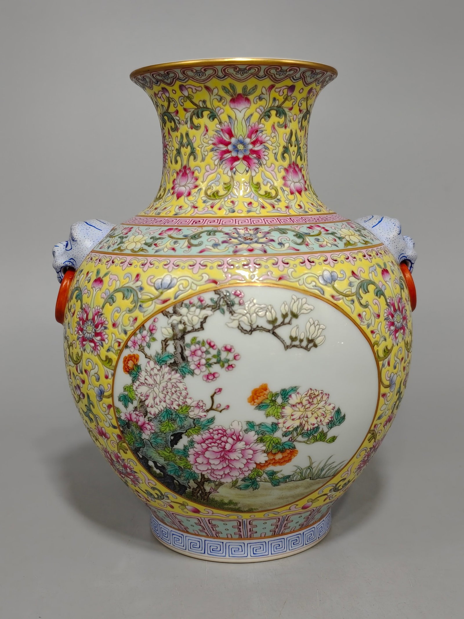 An Exquisite Famille-Rose Flower Pattern Beast-Ears Vase: An Exquisite Famille-Rose Flower Pattern Beast-Ears Vase,Qing Dynasty,China,Qianlong Six-character Mark,Size:10.2inx8.3in 粉彩花卉纹兽耳瓶中ࢲ