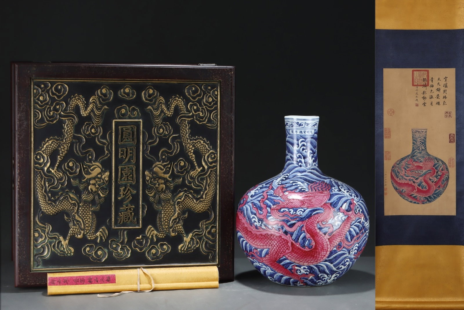 A Huge Blue and White Ruby Red-Glazed Seawater and Dragon Pattern Vase,with Chinese Vertical Scroll: A Huge Blue and White Ruby Red-Glazed Seawater and Dragon Pattern Vase,with Chinese Vertical Scroll Ink Painting on Silk,Ming Dynasty,China,Xuande Six-character Mark,Size:(Porcelain)16.9inx13.4in,(Wit