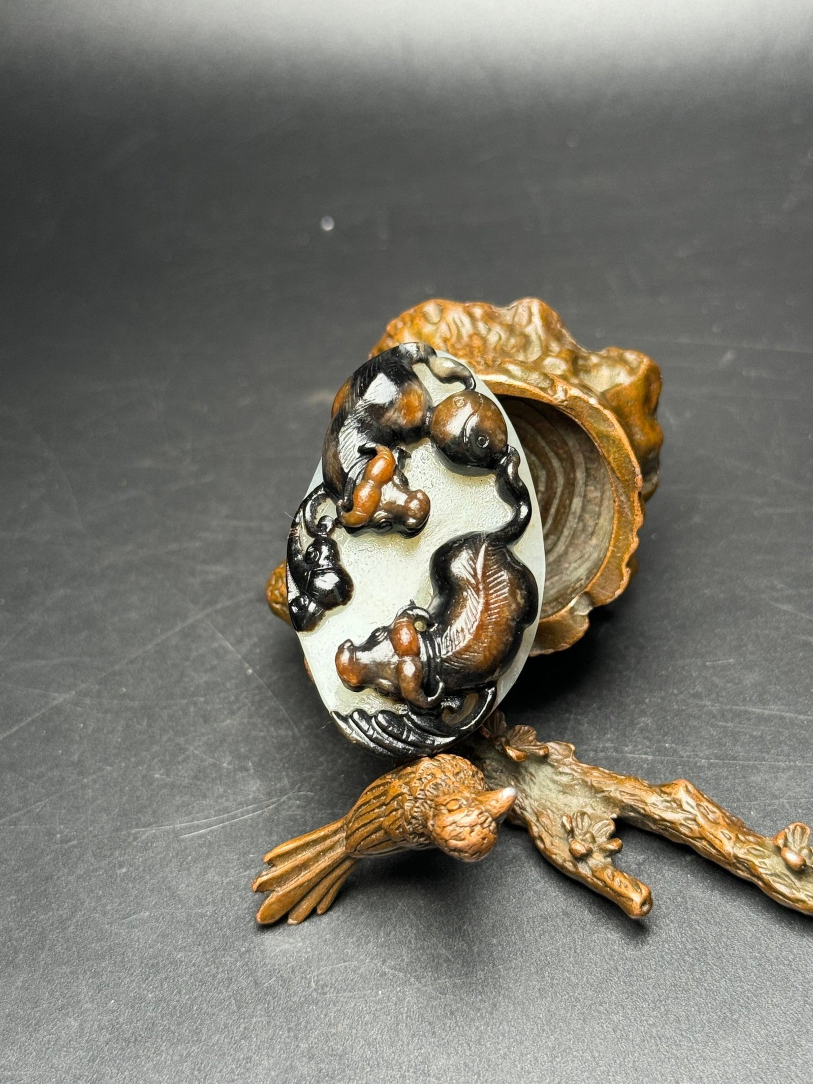 An Exquisite White Jade Buffalo Pattern Ornament: An Exquisite White Jade Buffalo Pattern Ornament,Qing Dynasty,China,Size:1.9inx1.1inx0.6in,Weight:25g 白玉牛纹摆件,中国清代
