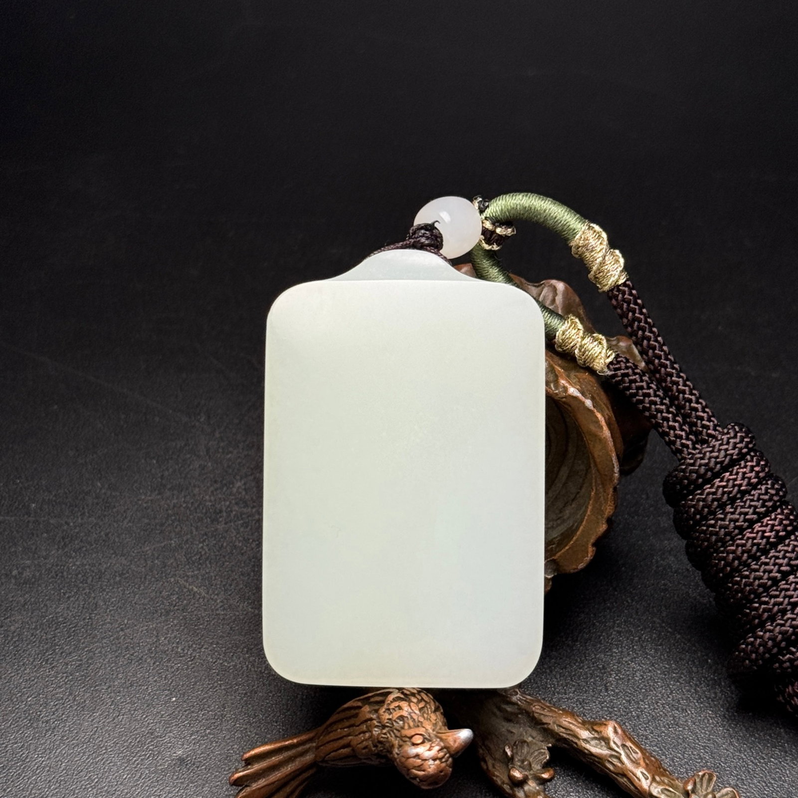 An Exquisite White Jade Pendant: An Exquisite White Jade Pendant,Qing Dynasty,China,Size:1.4inx2.1inx0.4in,Weight:61g 白玉牌,中国清代