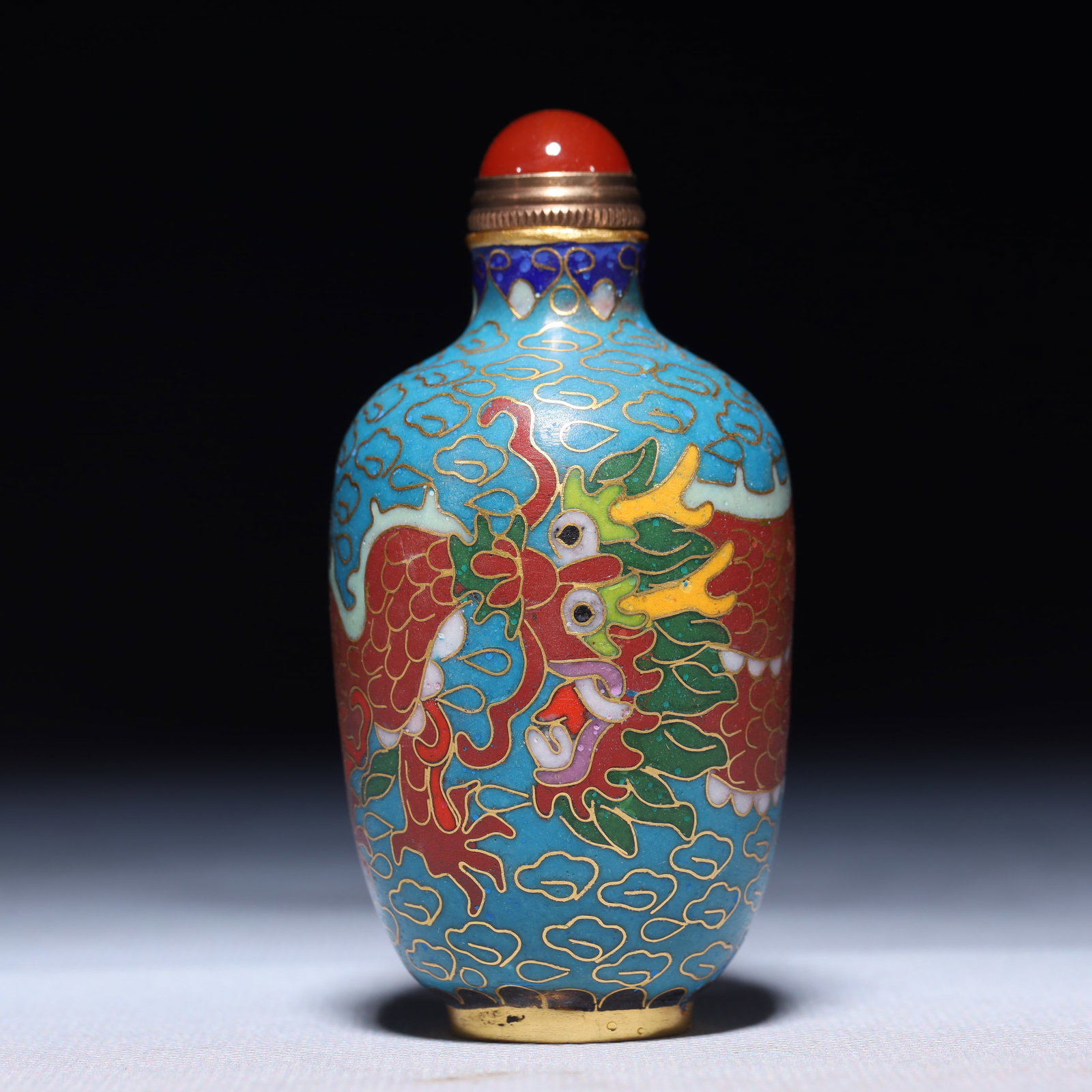 An Exquisite Cloisonne Auspicious Cloud and Dragon Pattern Snuff Bottle: An Exquisite Cloisonne Auspicious Cloud and Dragon Pattern Snuff Bottle,Qing Dynasty,China,Size:1.4inx3.1in,Weight:63.9g 景泰蓝祥云龙纹鼻烟壶