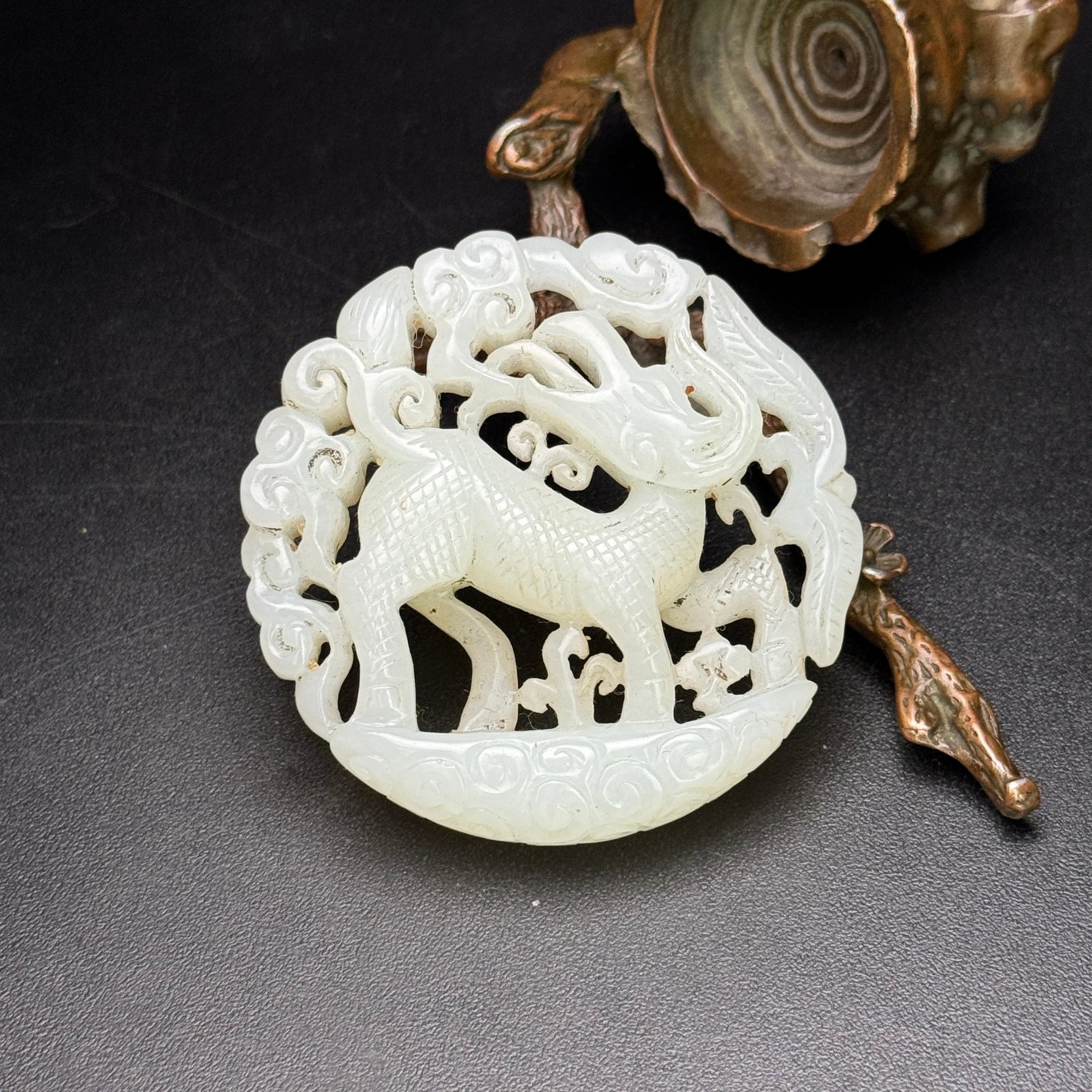 An Exquisite White Jade Kylin Pattern Pendant: An Exquisite White Jade Kylin Pattern Pendant,Qing Dynasty,China,Size:2.2inx0.5in,Weight:52g 白玉麒麟纹佩,中国清代